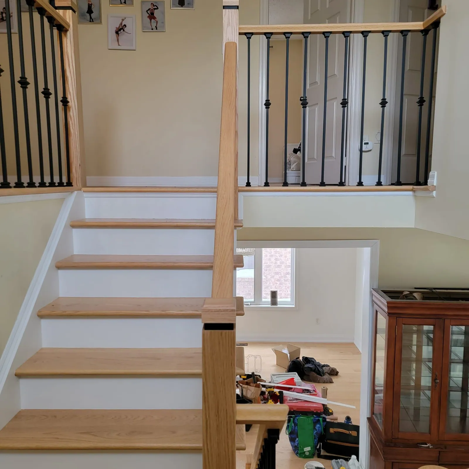 Oak treads and new railing in a split-level home.