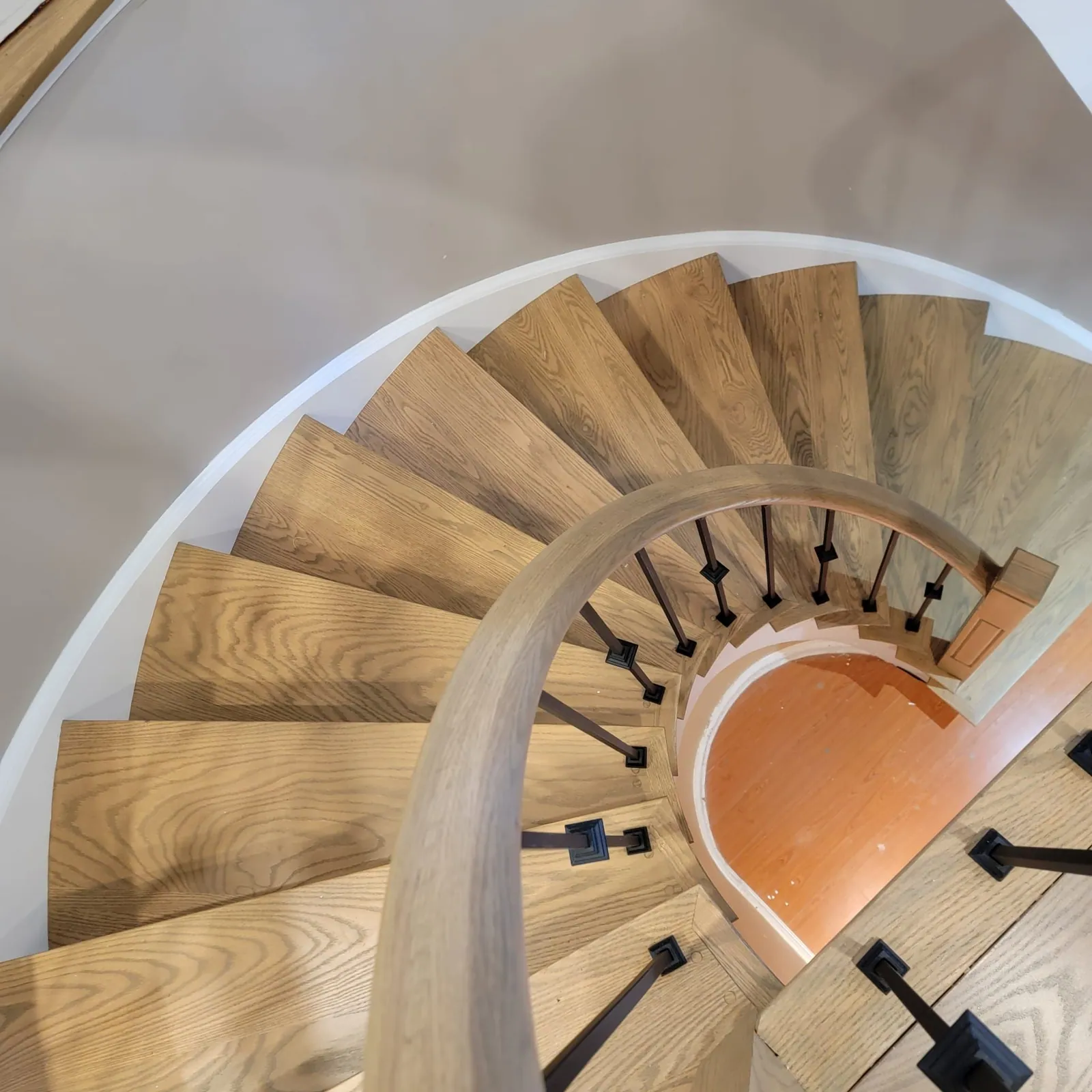 Spiral oak stair seen from the top.